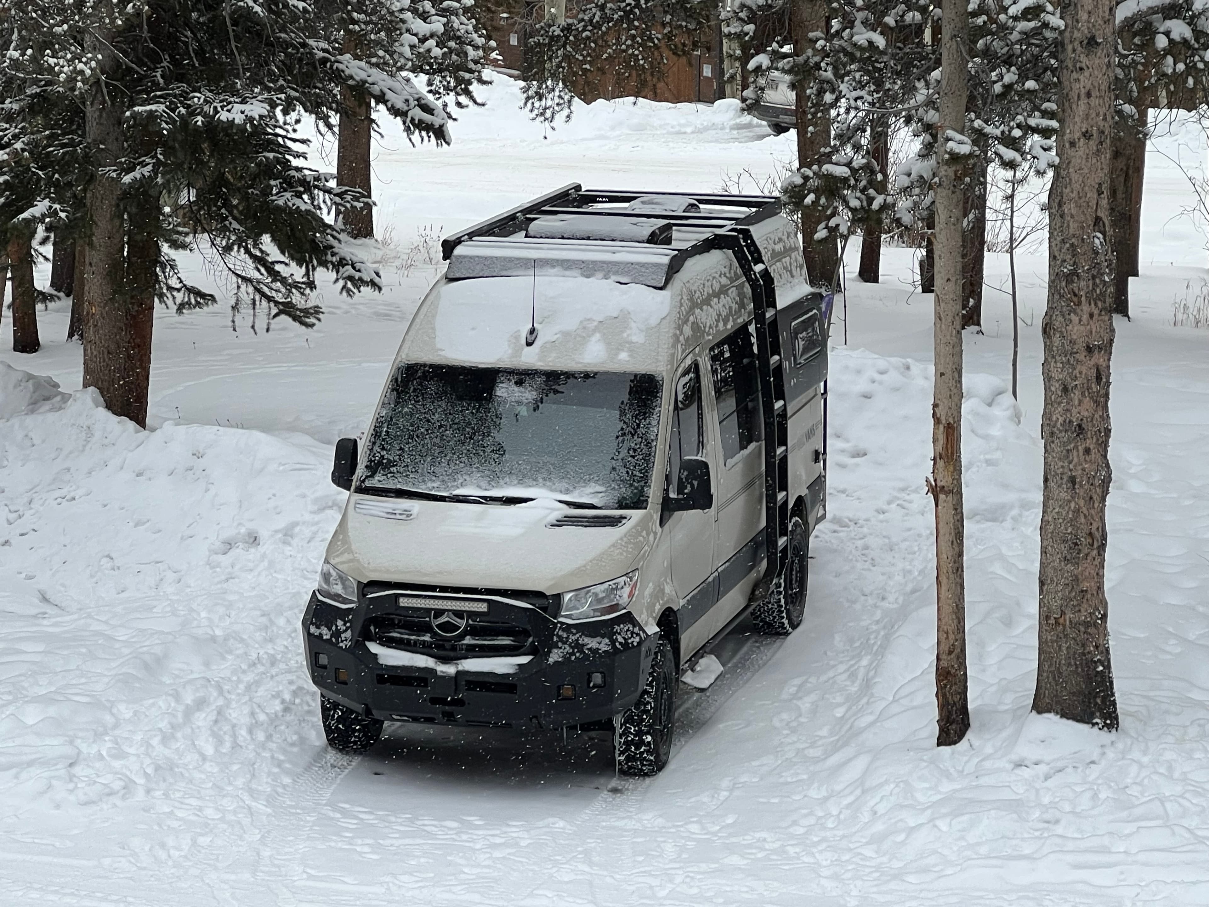 Ozark Mountain Van Company camper van in the snow