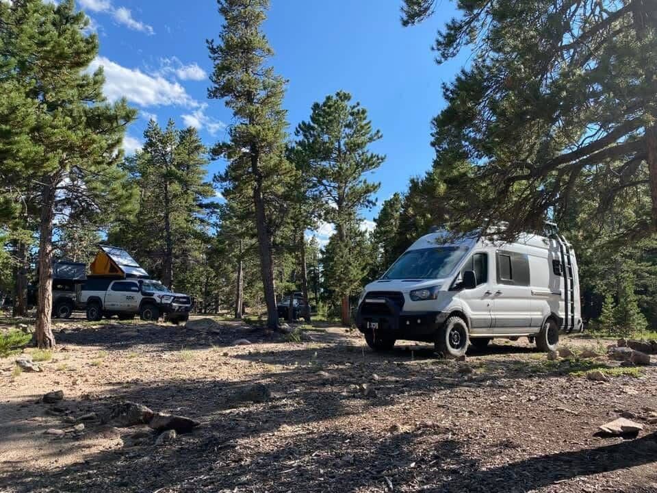 Van camping in the forest
